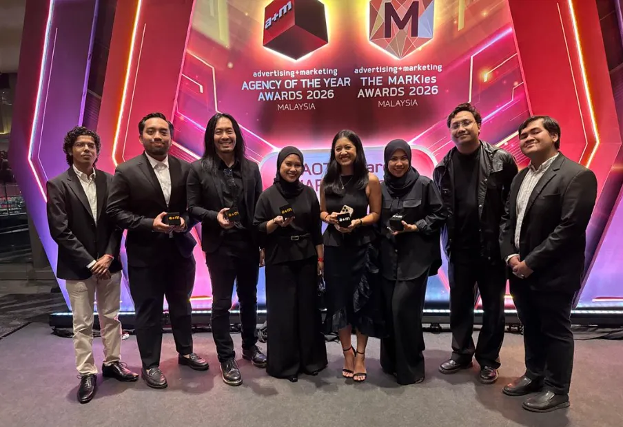 A group of people from Astro SHAW receiving awards